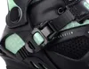 Close-up of a black and green inline skate buckle and strap. Podgląd zdjęcia produktu
