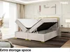 A bedroom scene with a bed that has its storage compartment open, showcasing the extra storage space. Produktbild-Vorschau