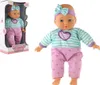 A doll is shown in its packaging and also outside of its packaging, against a white background. Podgląd zdjęcia produktu