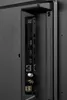 A close-up view of the ports and connectors on the back of a television. Produktbild-Vorschau