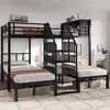 A black metal bunk bed with three sleeping areas and stairs in a room. Voir les images du produit