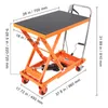 A hydraulic scissor lift table with dimensions indicated by text overlays. Voir les images du produit