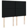 A black upholstered headboard with four square panels, supported by three wooden legs. Náhled obrázku produktu