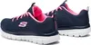 A pair of navy and pink Skechers sneakers shown from a side-angle on a white background. Podgląd zdjęcia produktu