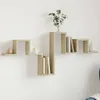A wooden wall shelf with books and decorative items against a white wall. Podgląd zdjęcia produktu
