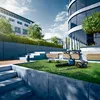 Gardening tools are displayed on a lawn in front of modern buildings. Produktbild-Vorschau