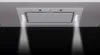 A white range hood is mounted under a cabinet, with two LED lights illuminating the dark surface below. Náhľad obrázku produktu