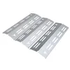 Four stainless steel grill heat plates arranged diagonally on a white background. Produktbild-Vorschau