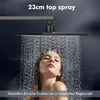 A woman is taking a shower under a modern showerhead, with water spraying down. Produktbild-Vorschau
