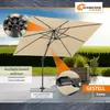An outdoor patio scene with a large beige umbrella. Produktbild-Vorschau