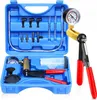 A blue plastic case containing a vacuum pump and brake bleeder kit, with the pump assembly outside the case. Anteprima dell’immagine prodotto