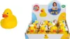 A display box of rubber ducks with a child playing with ducks in the background. Anteprima dell’immagine prodotto