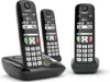 Three black Gigaset cordless phones are displayed against a white background. One phone is on a charging base, and two others are in separate charging cradles. Anteprima dell’immagine prodotto