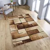 A rectangular rug with a geometric pattern is placed on a wooden floor in a room with a chair and a table. Náhled obrázku produktu