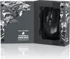 A gaming mouse is displayed in its opened packaging, which features a stylized wolf graphic. Produktbild-Vorschau