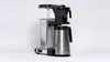 A coffee maker with a thermos carafe is shown against a white background. Produktbild-Vorschau