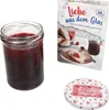 A jar of jam, a recipe book, and a jar lid are displayed against a white background. Podgląd zdjęcia produktu
