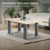 A modern living room setting with a coffee table and sofa. Produktbild-Vorschau