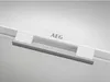 A close-up of a handle on a white appliance, with the brand logo visible. Produktbild-Vorschau