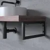 A modern bathroom sink console with a wooden shelf and black metal support. Produktbild-Vorschau