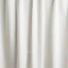 A close-up view of a beige curtain with vertical ribbed texture. Produktbild-Vorschau