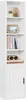 A tall, narrow white bookshelf with multiple open shelves and a closed cabinet at the bottom, decorated with books and decorative items. Náhled obrázku produktu