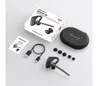 A flat lay of a Bluetooth headset and its accessories, including the packaging box, charging cable, charging case, and ear tips. Podgląd zdjęcia produktu