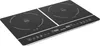 A black double induction cooktop with silver trim and controls, shown at an angle against a white background. Náhľad obrázku produktu