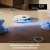 A white robot vacuum cleaner is shown on a wooden floor, with a blue teddy bear and blue slippers nearby. The vacuum emits a blue light. Produktbild-Vorschau
