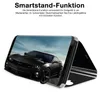 A smartphone case is shown in a stand-up position, displaying a black car on its screen. Produktbild-Vorschau