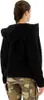 A woman is shown from the back wearing a black fuzzy jacket and camouflage pants. Produktbild-Vorschau