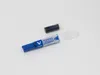 A blue whiteboard marker and its cap are shown on a white background, along with a separate black ink cartridge. Anteprima dell’immagine prodotto