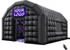 An inflatable black party tent with a sign above the entrance that says "YOUR LOGO". The entrance shows colorful lights inside. Anteprima dell’immagine prodotto
