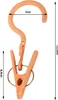 A single orange clothespin with a hook, shown against a white background with measurement indicators. Anteprima dell’immagine prodotto