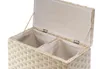 A close-up view of an open, beige, woven laundry hamper with two compartments, shown against a white background. Podgląd zdjęcia produktu