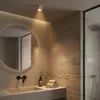 A modern bathroom with a sink, mirror, and shower. Náhľad obrázku produktu