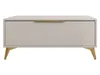 A front view of a sandbeige coffee table with a gold handle and gold metal legs. Náhľad obrázku produktu