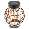 A solar-powered lantern with a black metal frame and brown woven accents. Produktbild-Vorschau