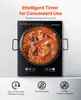 An induction cooktop with a paella dish on it, with feature callouts below. Náhled obrázku produktu