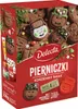 A box of Christmas gingerbread cookies with decorating supplies. Podgląd zdjęcia produktu