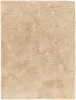 A close-up, top-down view of a beige shag rug. Produktbild-Vorschau