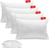 A stack of white pillows with a textured pattern. Produktbild-Vorschau