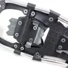 A close-up view of the binding mechanism on a snowshoe. Voir les images du produit