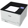 A white and black Canon laser printer with a sheet of paper in the input tray. Náhled obrázku produktu