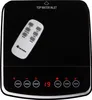 A black electronic device with a remote control on top and illuminated buttons and a digital display at the bottom. Náhled obrázku produktu