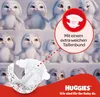 Marketing image for Huggies baby diapers featuring animated bunnies and a close-up of a diaper. Náhľad obrázku produktu