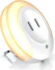 A white LED night light with a USB charging port and a warm yellow glow. Produktbild-Vorschau