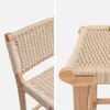 Close-up shots of a bar stool showing the woven seat and wooden frame. Produktbild-Vorschau