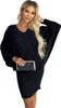 A woman wearing a black dress and holding a clutch bag. Anteprima dell’immagine prodotto
