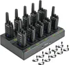 A set of walkie-talkies and their charging station, with additional headsets shown in the foreground. Produktbild-Vorschau